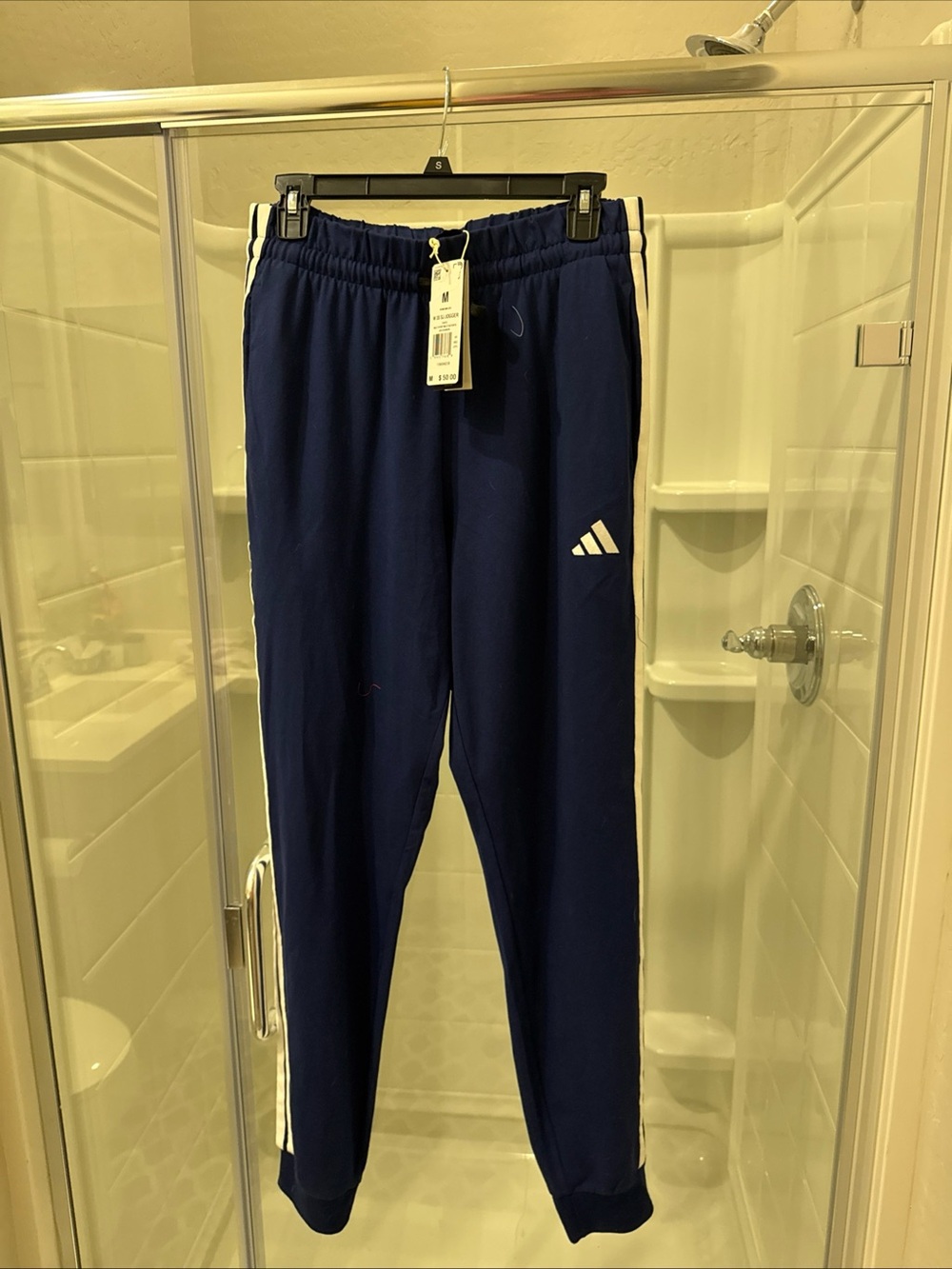 Adidas women’s  Navy Blue Track Pants with White Stripes